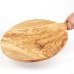 Planche de service ronde en bois d'olivier